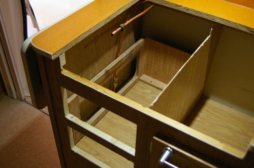 Kitchen Mods Escape Trailer Owners Community The Cut Out Has Been Made Larger For New Stovetop I Don T Think Structure Will Fit Though Old Stove Opening Or Through Cabinet Door